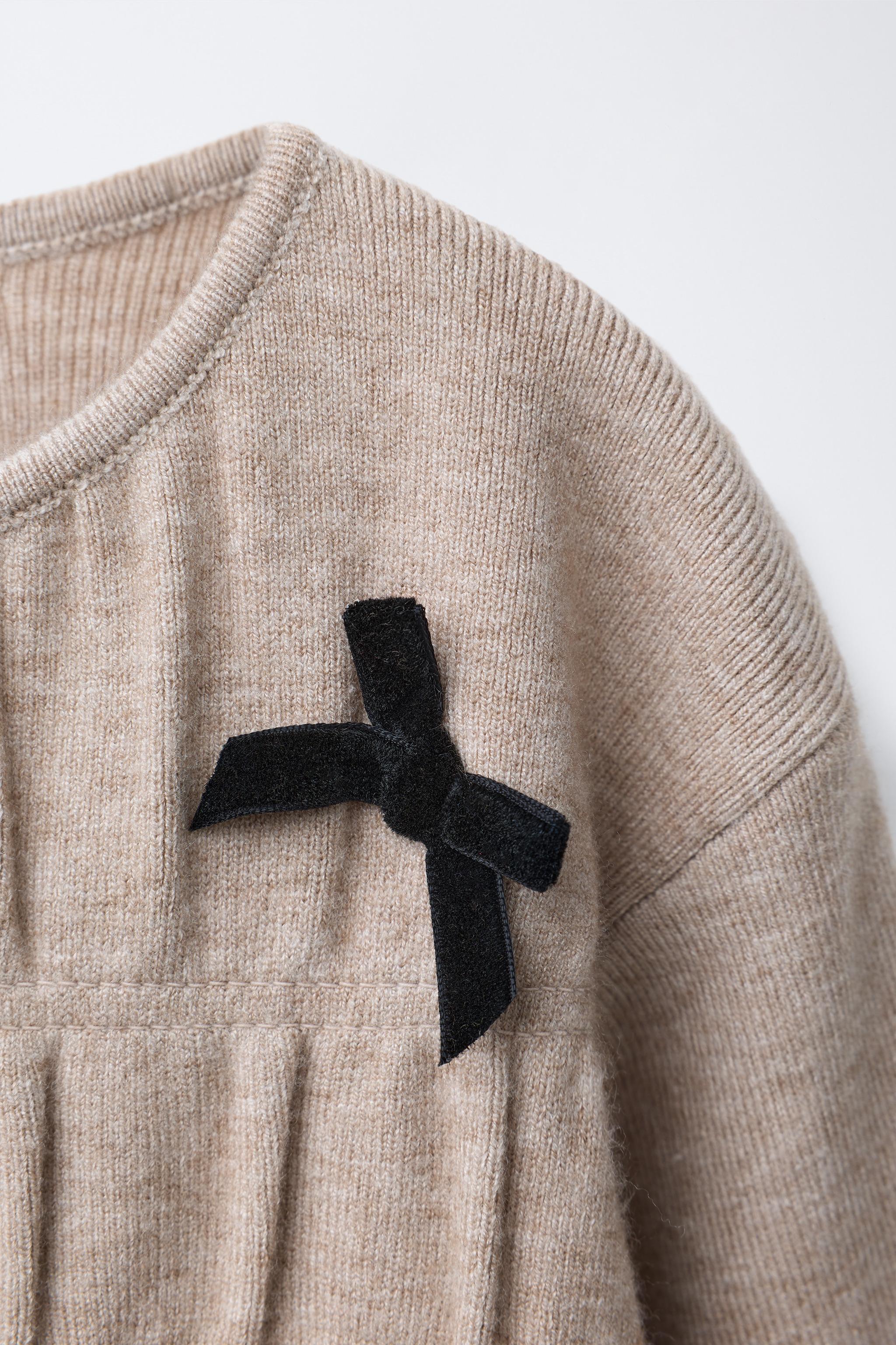 KNIT DRESS WITH BOWS